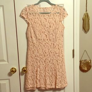 Lace dress with pleats and sweetheart slip